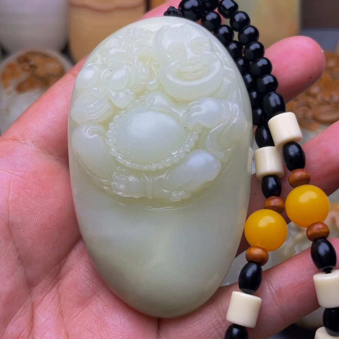 石材方解石手把件佛