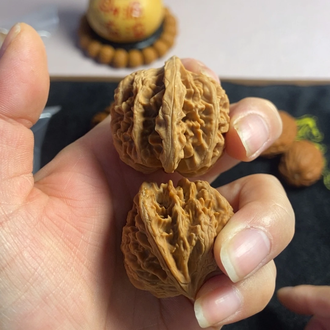 吊坠桃核苹果园狮子头68