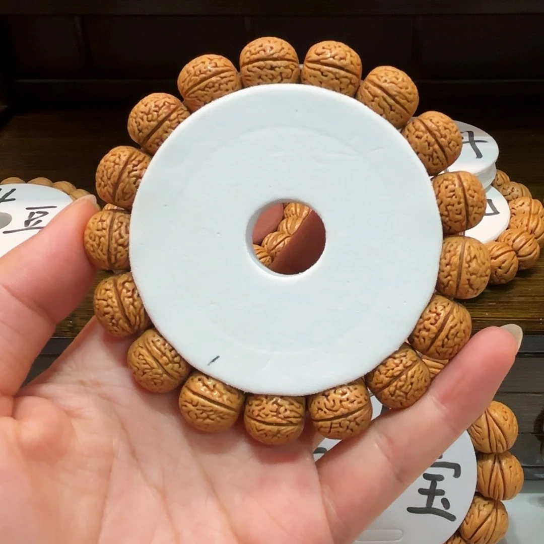 ?*野生蚂蚁蛋桃核小手串