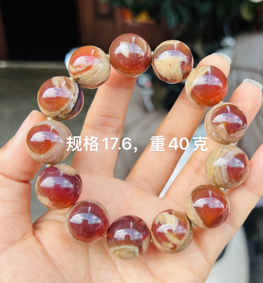 天然缅甸琥珀红蜜容洞手串