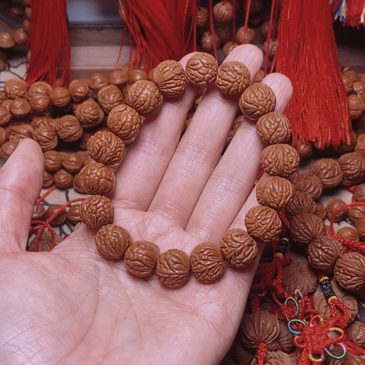 桃核吊坠桃枭手串