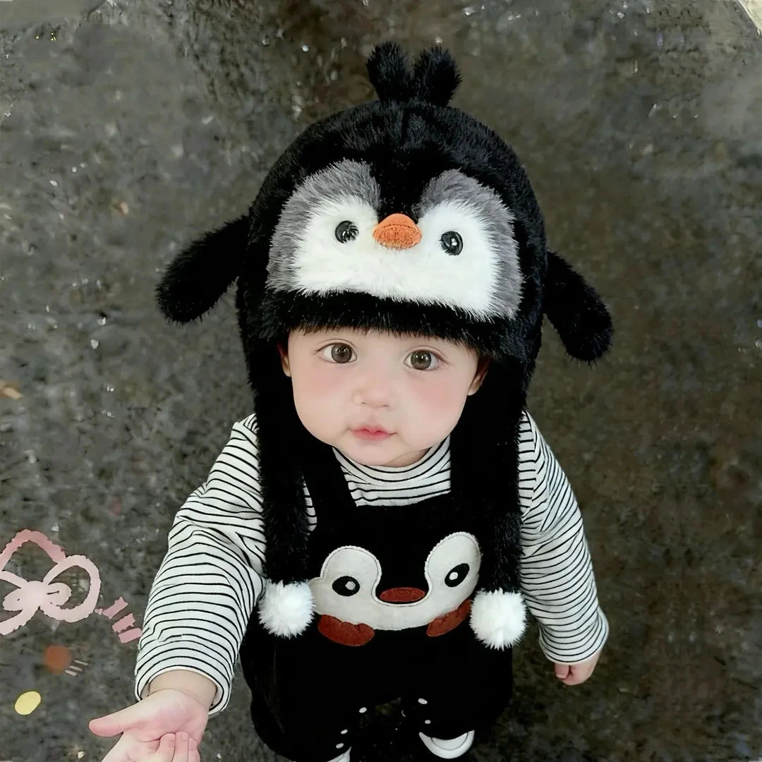 儿童冬季帽子会响企鹅毛绒帽洋气可爱男童女童上学专用防寒护耳帽