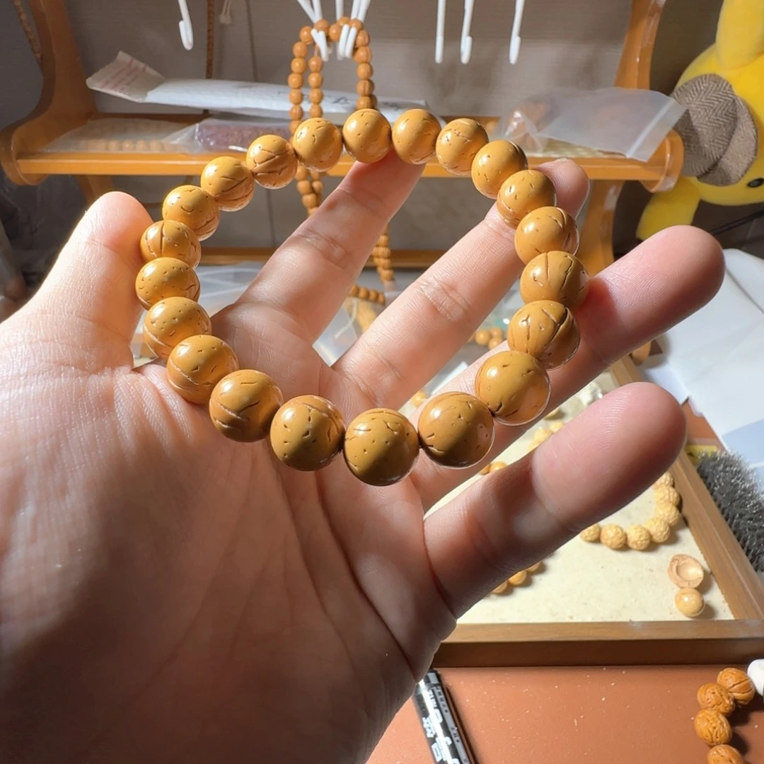 李****桃核吊坠盘锦奶油核