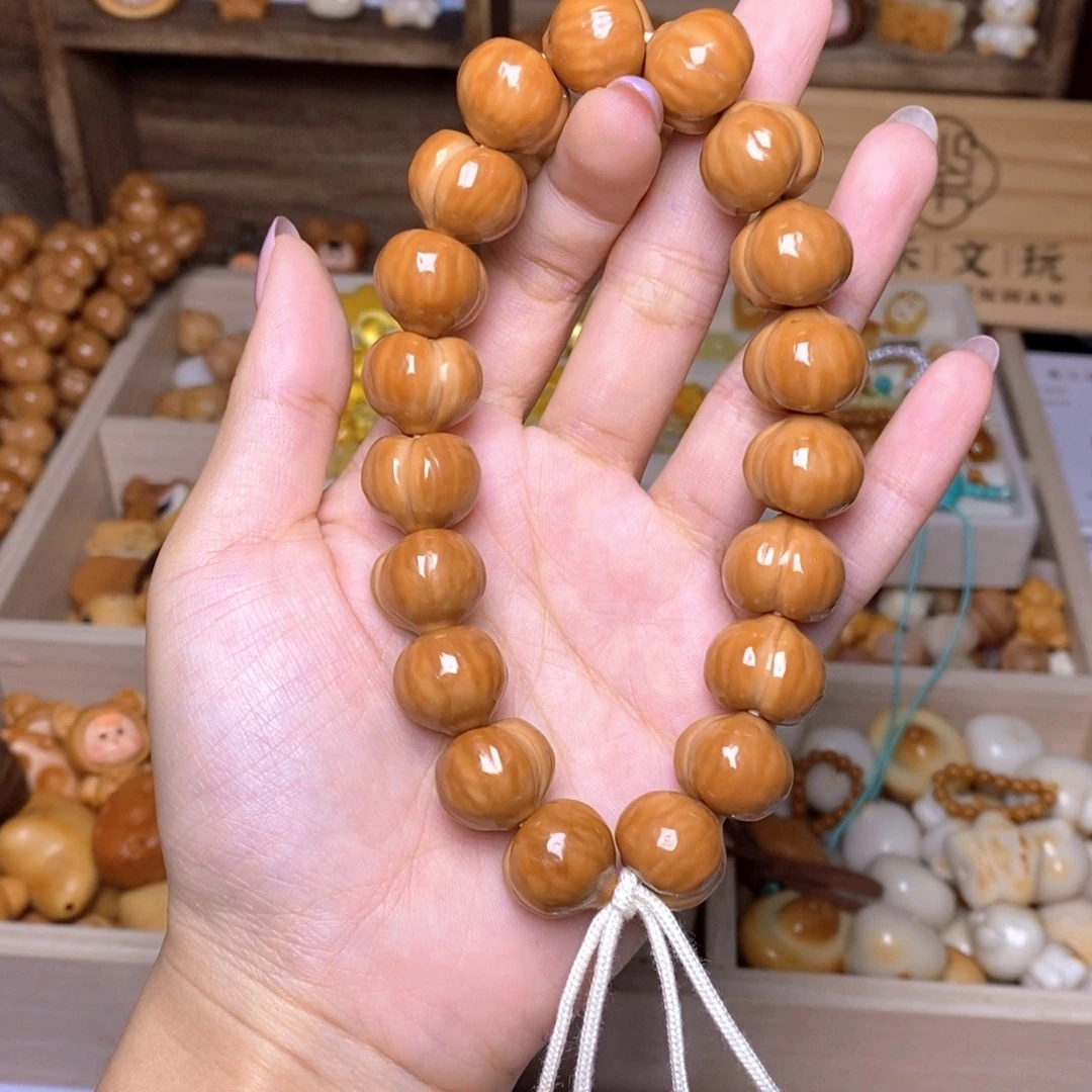 L***’猴头核桃吊坠16屁桃手持