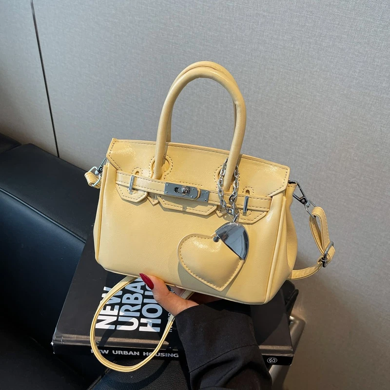 今年夏天流行夏季韩版温柔气质手提凯莉包包女女款包包单肩斜挎包