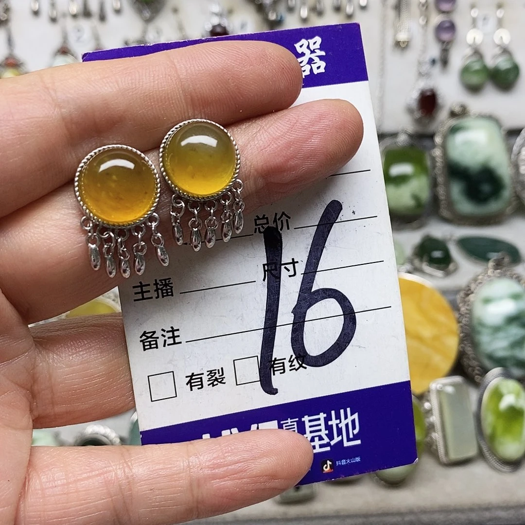 沐***澜银S925镶嵌蛇纹石玉耳环