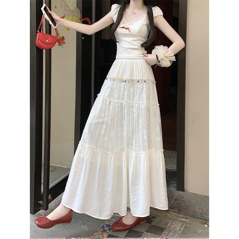 法式流行亮片半身裙女夏季2025新款设计感木耳边高腰蛋糕长裙