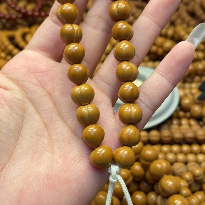c****核桃微瑕亮面小屁桃手持