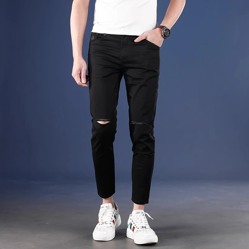 夏季薄款破洞纯黑色九分休闲裤男款修身小脚爆款2025新款男士裤子