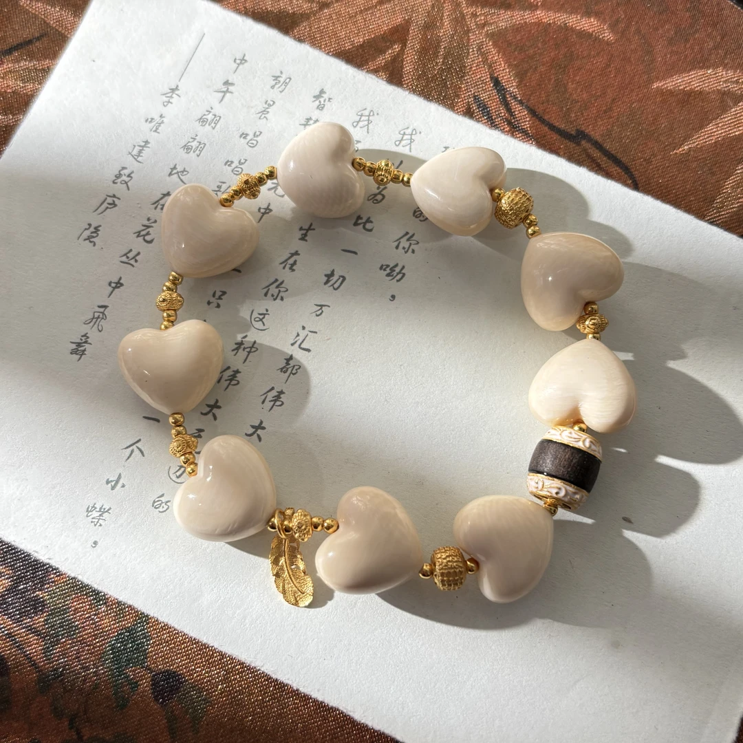 【金菀菀】天然猛犸牙爱心树叶手串
