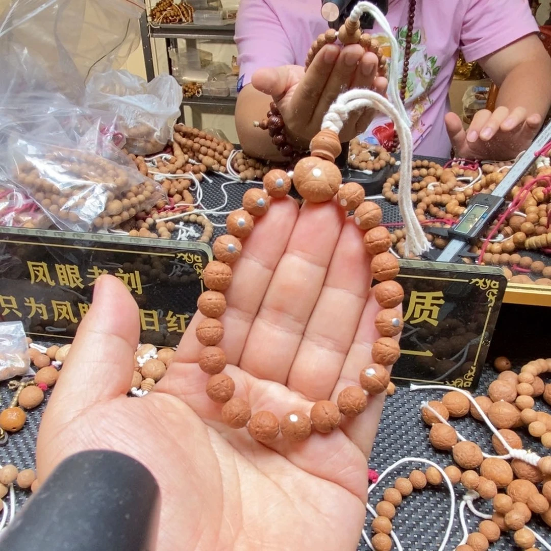 凤眼菩提吊坠9.5银钉坏籽手串