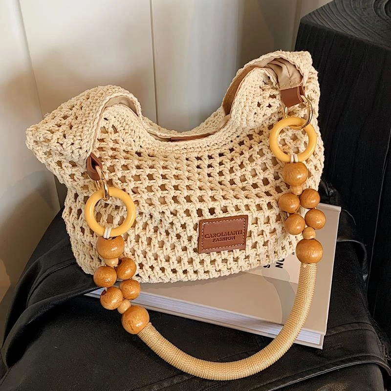 夏季洋气镂空编织托特包包女2025新款休闲手提草编包大容量斜挎包