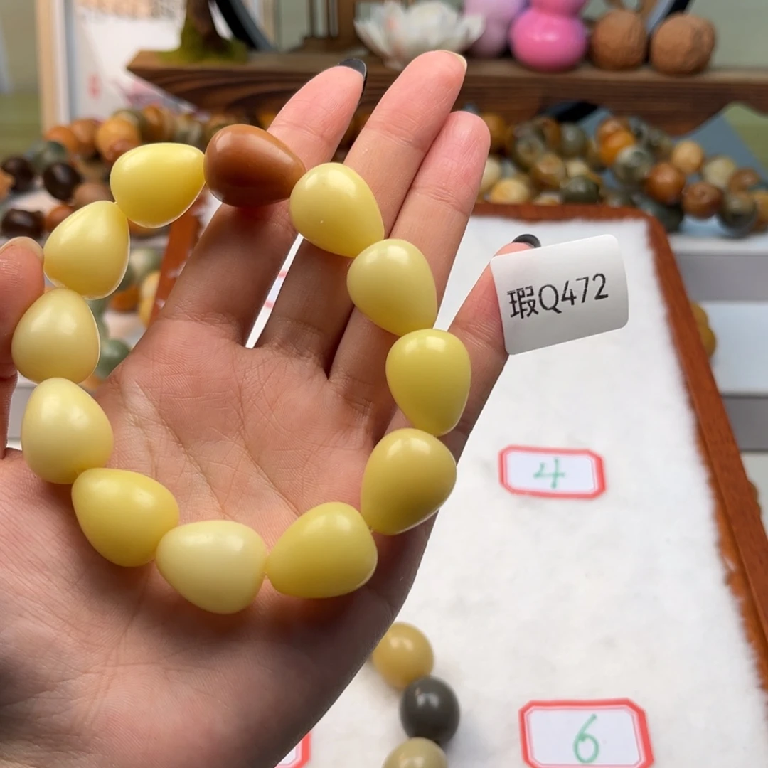 菩提根/象牙果吊坠阿*木16mm水滴珠一串瑕q472