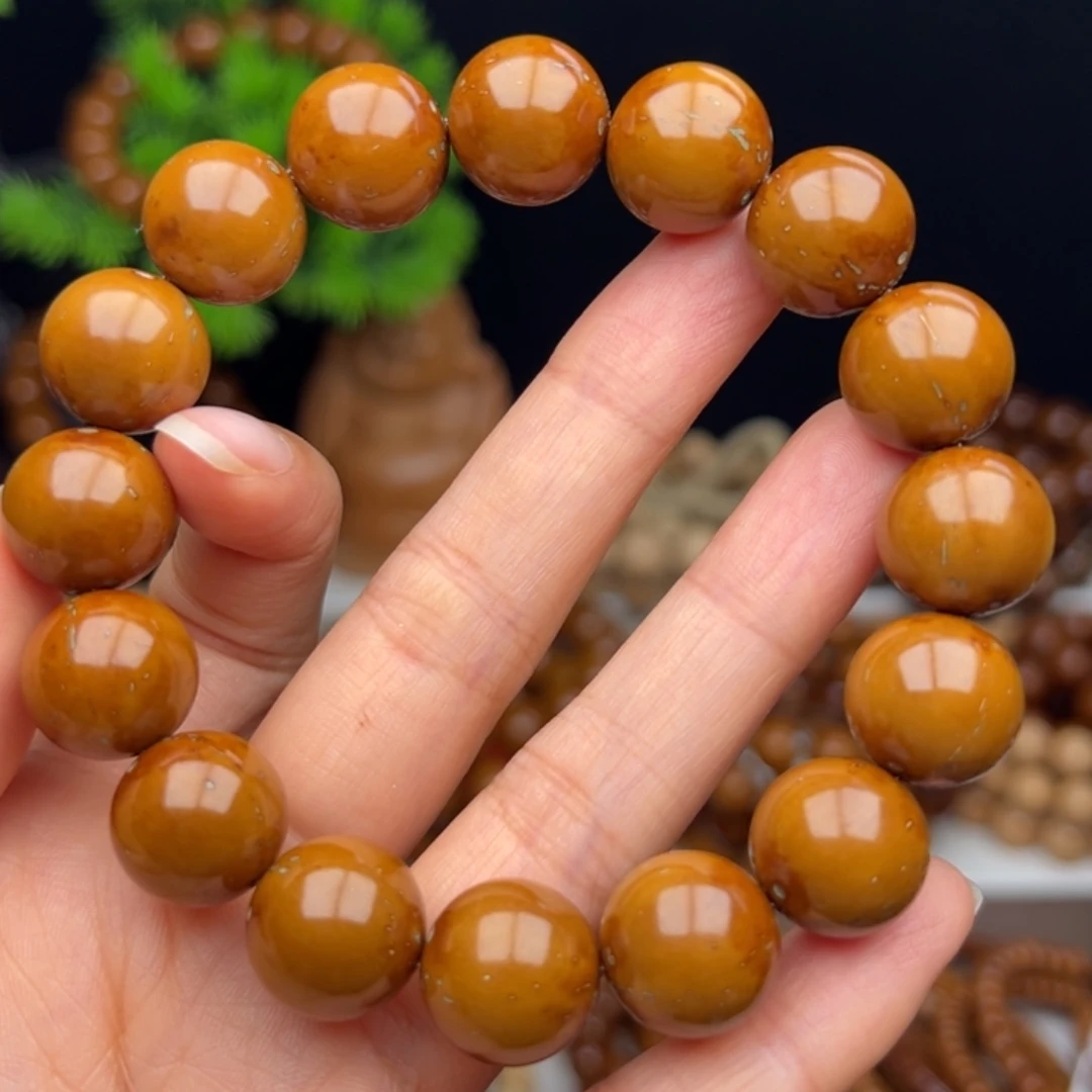 冉***卿紫金鼠手串卡14.5半实心光珠