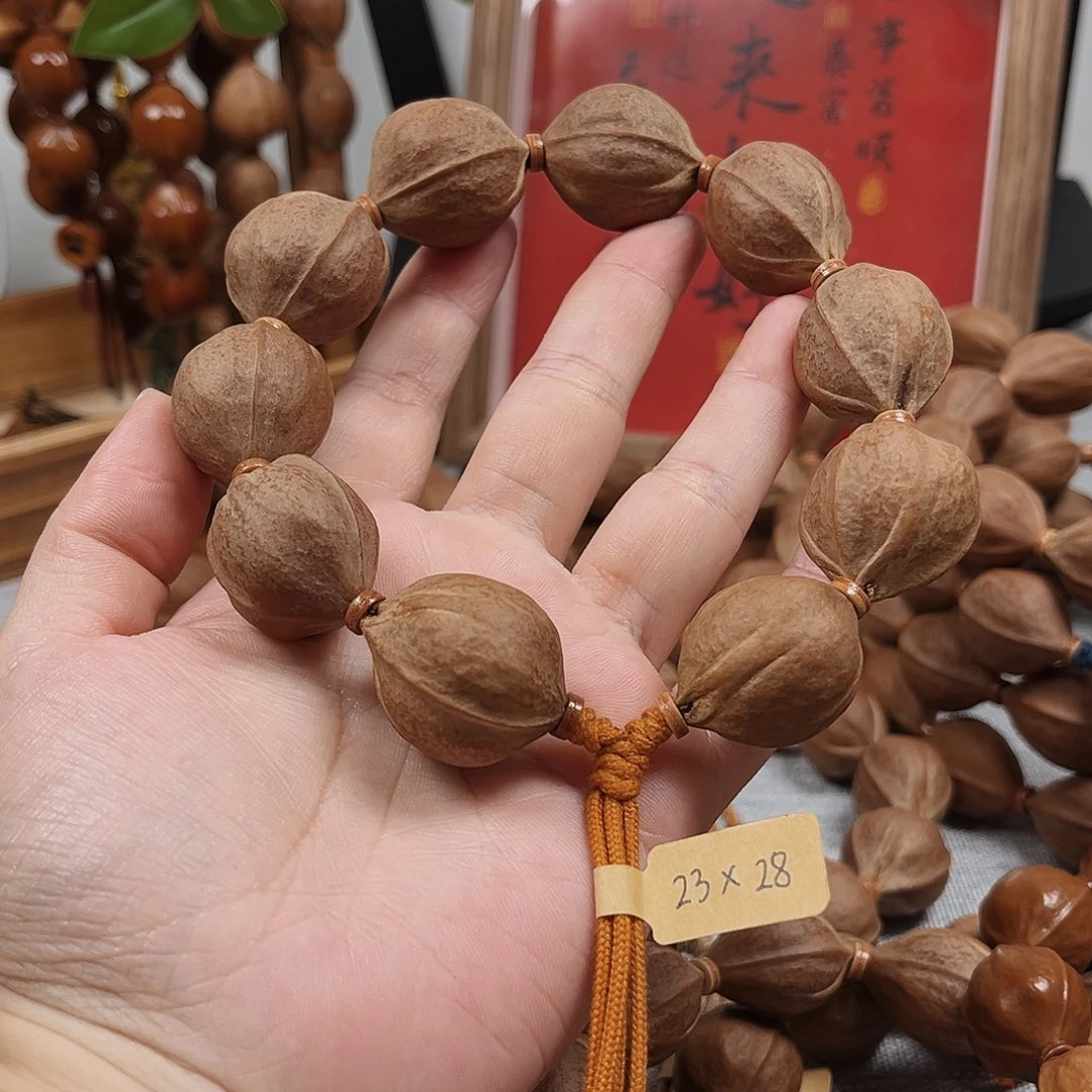 阿****橄榄核手串梅林铁核23.28橄榄核