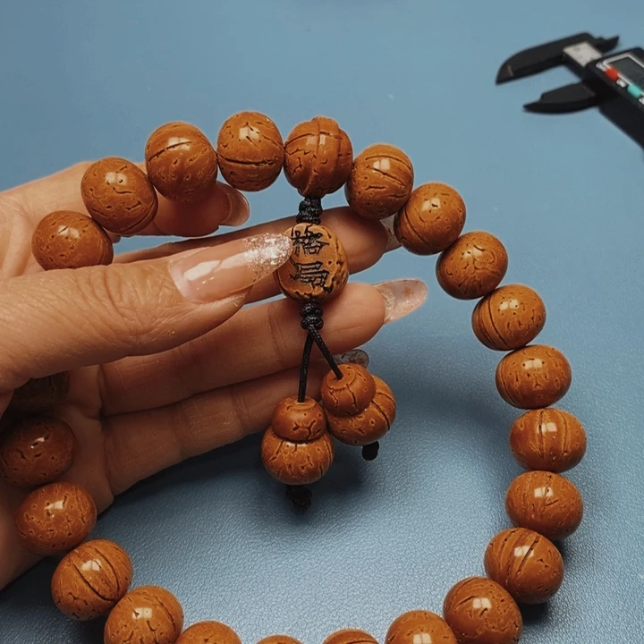 桃核手持算盘17花皮色差21颗