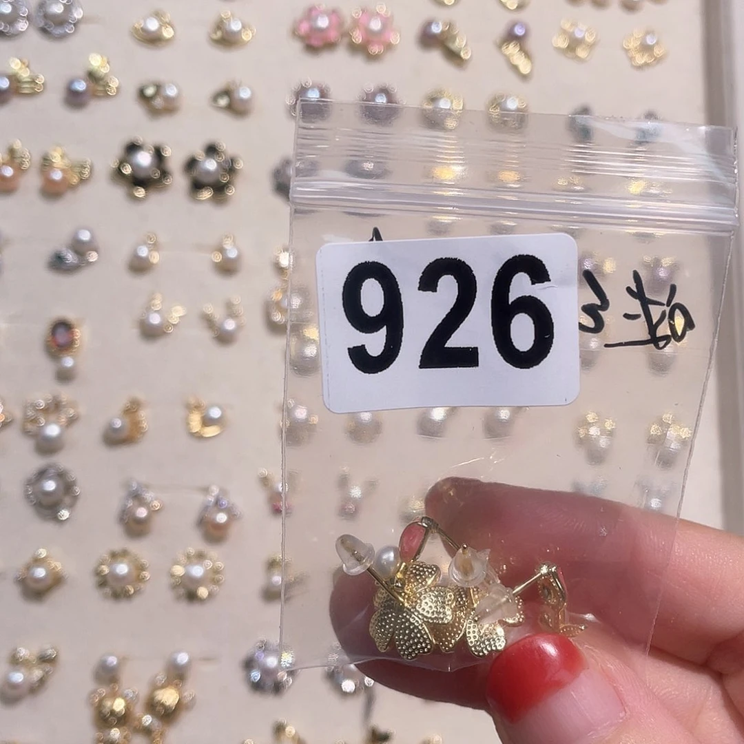 合金淡水珍珠耳饰哒***琦