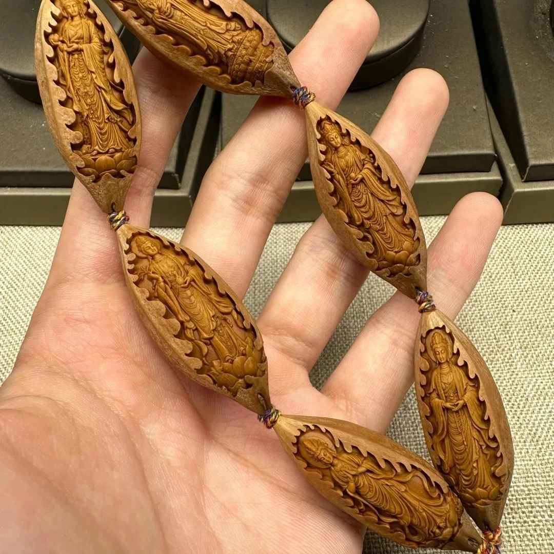 藏越，原皮风景观音橄榄核雕手串10