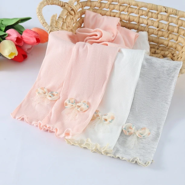 橘色蝴蝶结夏季薄款弹性女童裤子九分打底裤