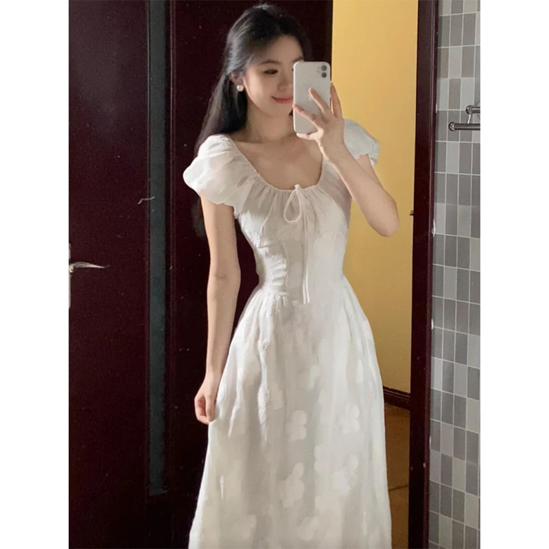 法式温柔风提花泡泡短袖收腰连衣裙女夏季气质修身显瘦长款A字裙