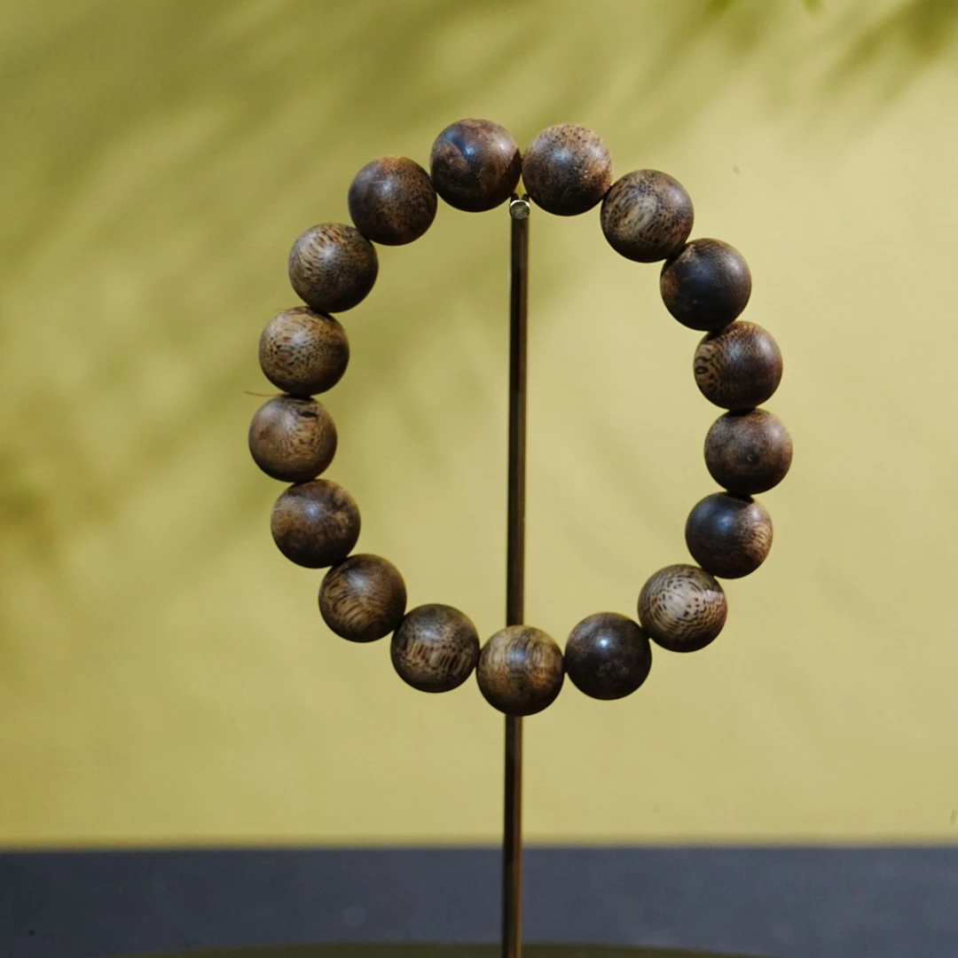 "金三角黑棋软丝手串1.3cm  16.3g 251004004 A"