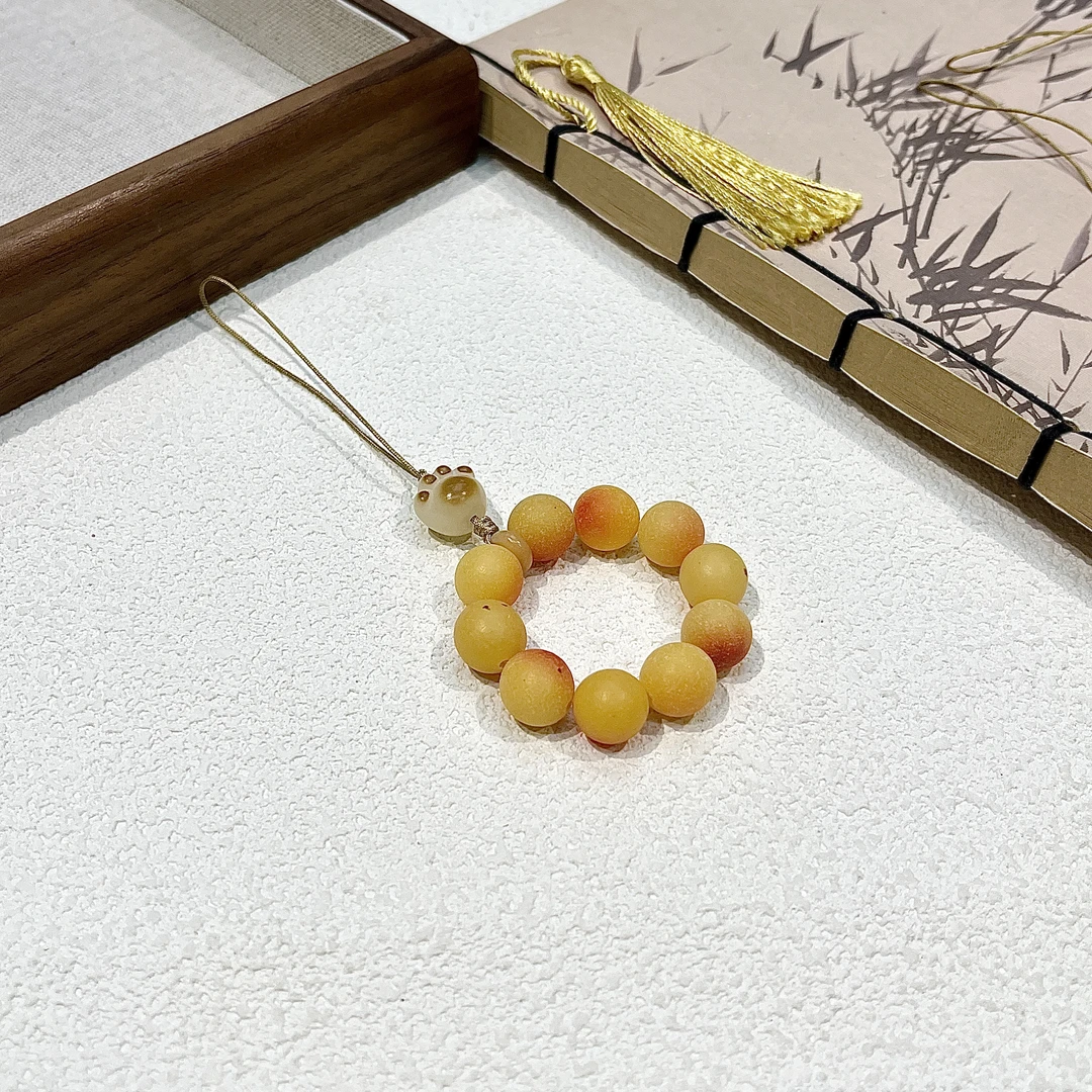 去皮黄桃飘花圆珠嘉南手机链   G-B025035