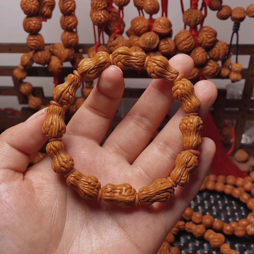 木质类龙纹桃枭手串