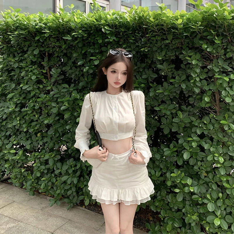 初恋小白花 夏季新款时尚短款衬衫上衣+蝴蝶结下摆花边短裙套装女