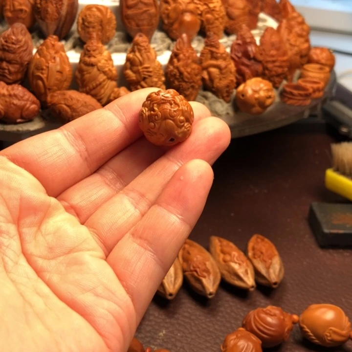 交***记吊坠橄榄核橄榄核雕刻的手把件