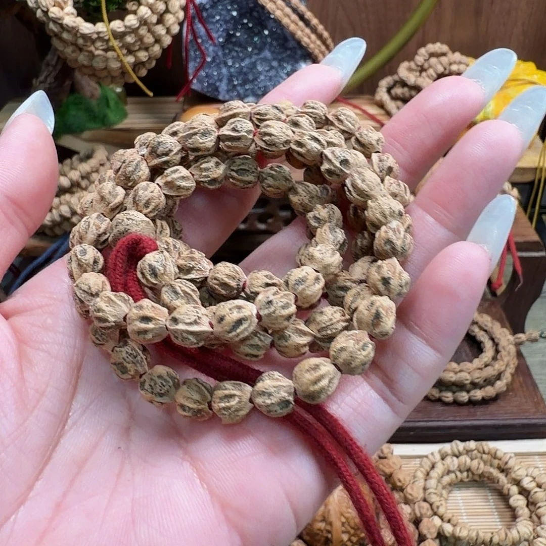 颖***宝柏香籽/百香籽吊坠