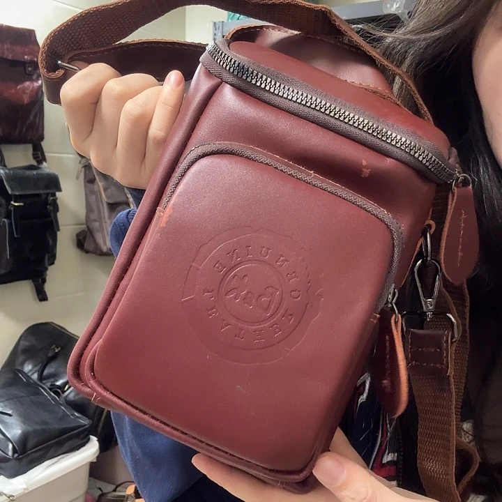 雨***点有瑕疵斜挎相机包