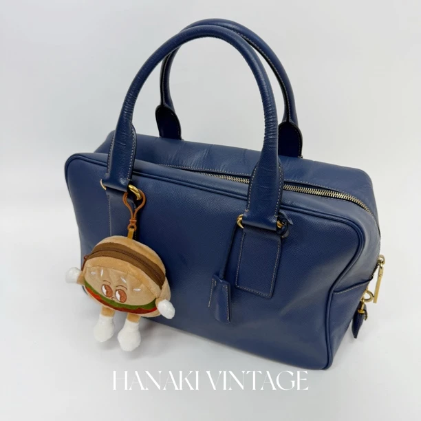 95新 Prada/普拉达 花绮二店/Prada蓝色侧标plume单肩包