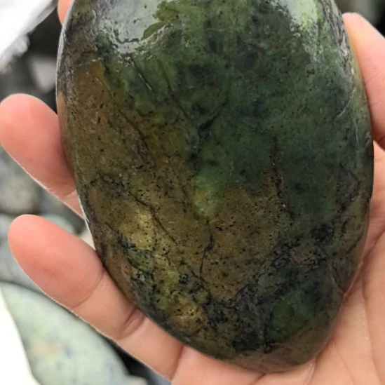 石材沧**粟藏玉药王石原石手把件一个