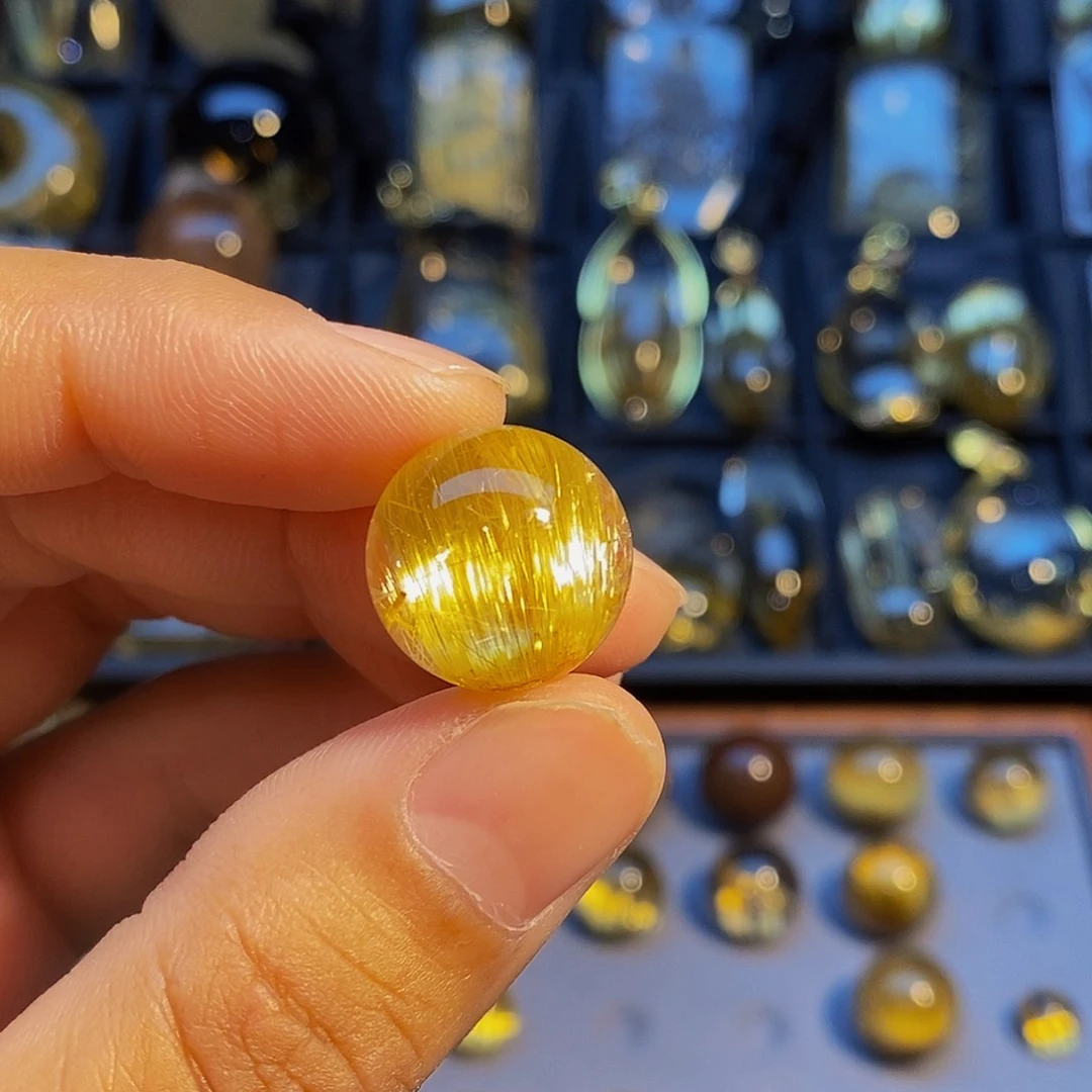 未镶嵌颈饰水晶洋*?天然钛晶单珠直径16.6毫米