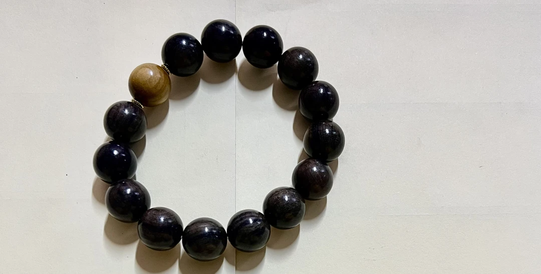 木犀鸟金丝楠手串