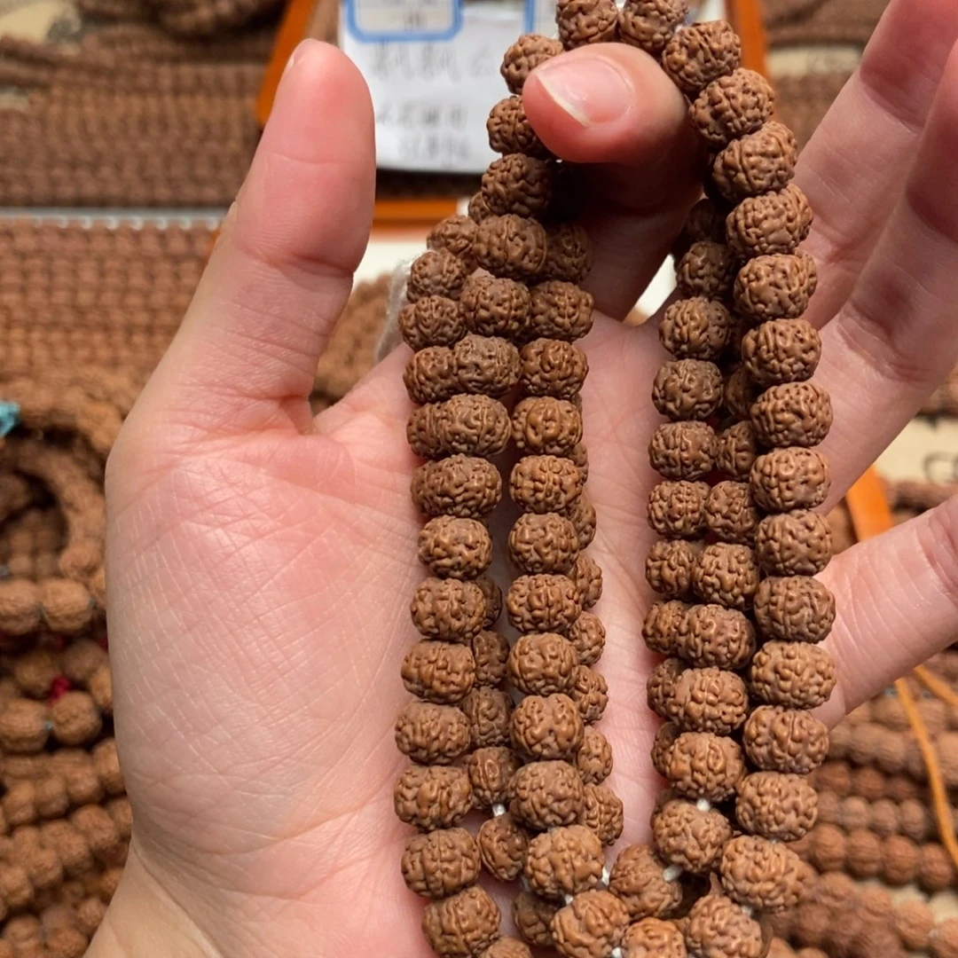 坷***垃金刚菩提吊坠老树梅花108卡8