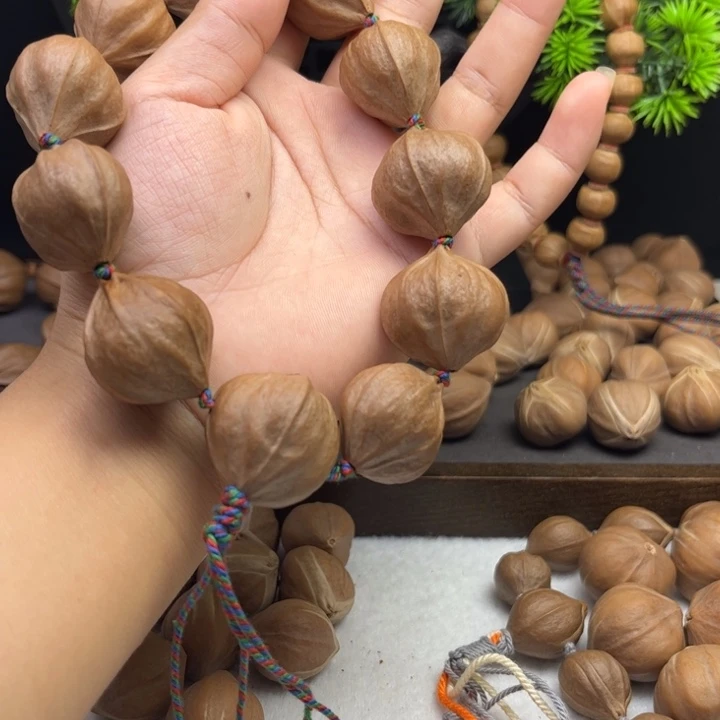 妄***i橄榄核手串/手链2.5*2.7四花铁核