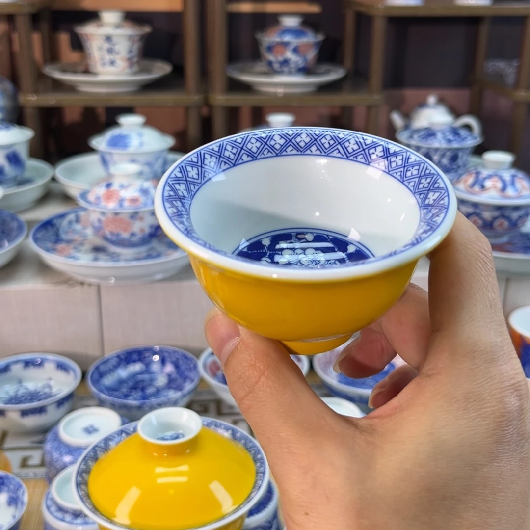 外帝王黄釉内绘冰梅压手杯