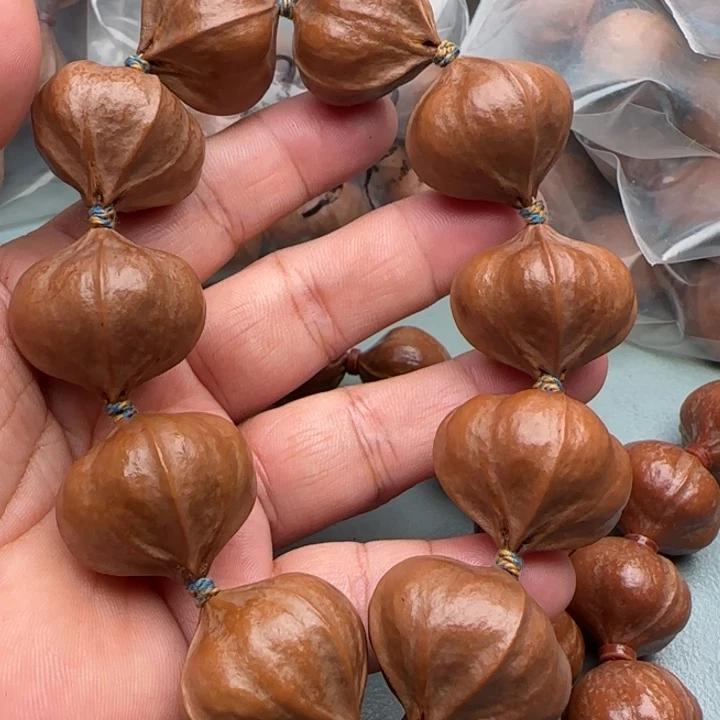 h***b橄榄核手串橄榄核原皮铁核四花