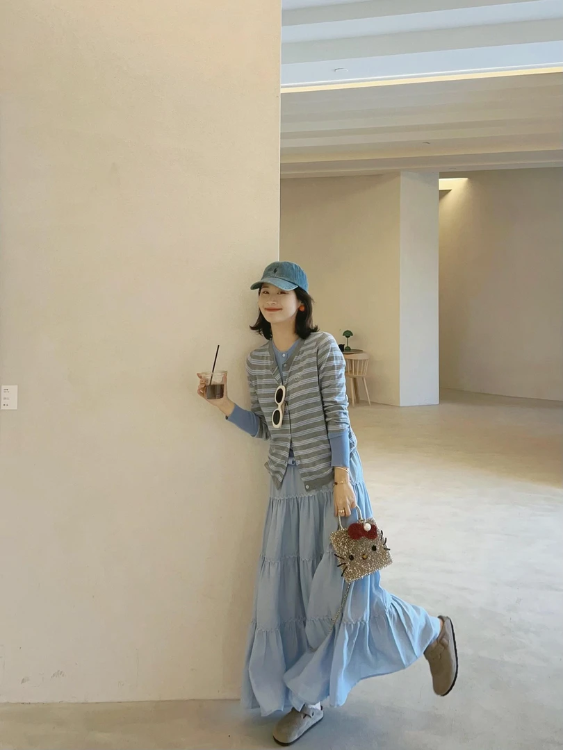 2025春季新款韩系穿搭设计感条纹假两件针织开衫搭配半身裙两件套