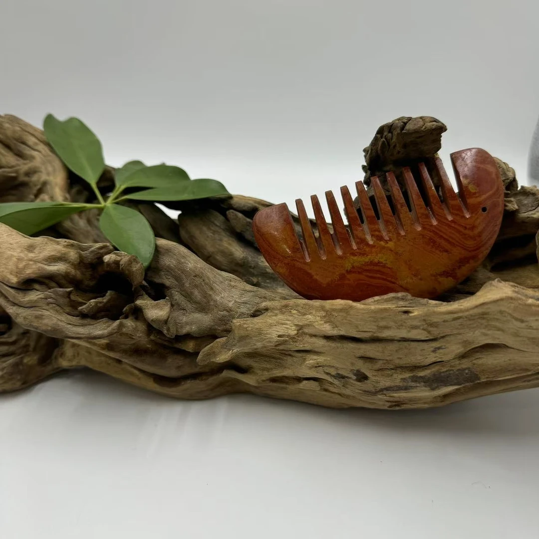 砭石文化博物馆推荐泗水红砭石半圆梳子