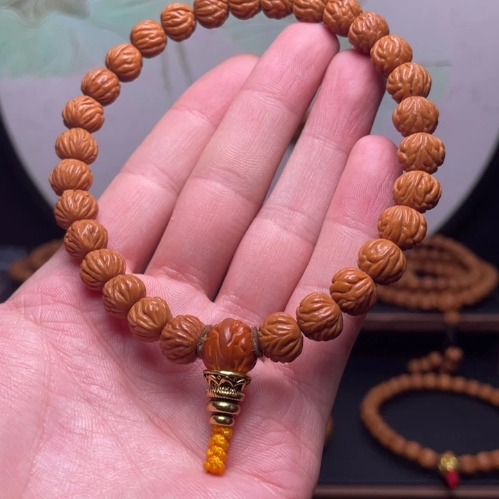 桃核手串10.5金蟾手持