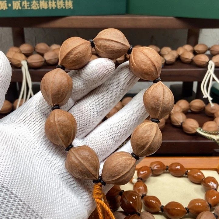 T***T橄榄核手串2229三花大籽