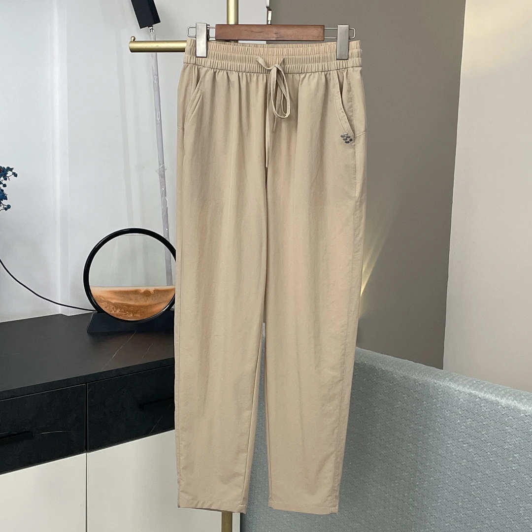唐姐优选2025夏休闲裤运动裤夏季薄款运动风弹力透气哈伦裤2501
