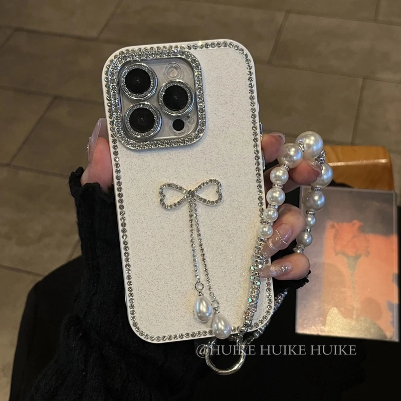 高级感气质镶钻蝴蝶结适用苹果16手机壳iphone15/14/13promax手链