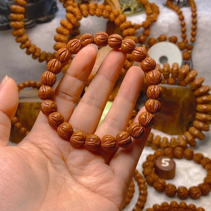 桃核手串?****平红皮玉龙脊单圈