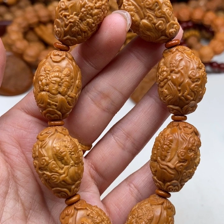 坏***。橄榄核吊坠龙万佛