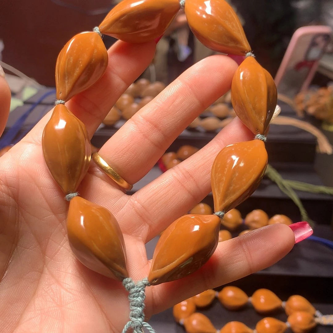 橄榄核手串/手链是**呢三花手串