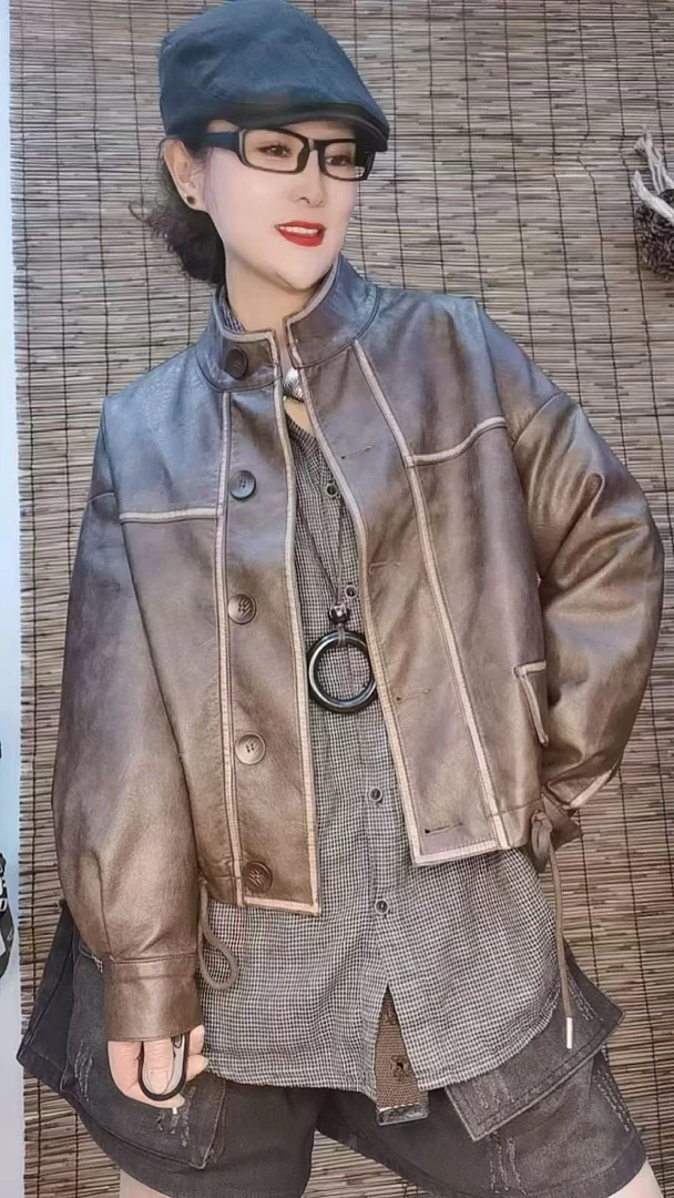 时尚长袖极简风皮衣拼接重工秋季厚款纽扣设计师短款