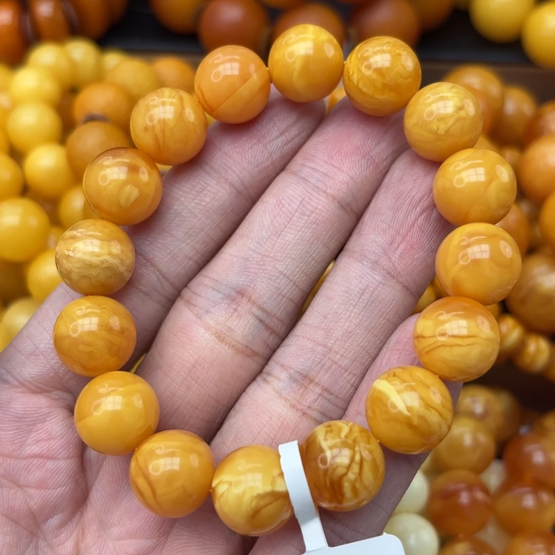 菩***下琥珀未镶嵌手链蜜蜡